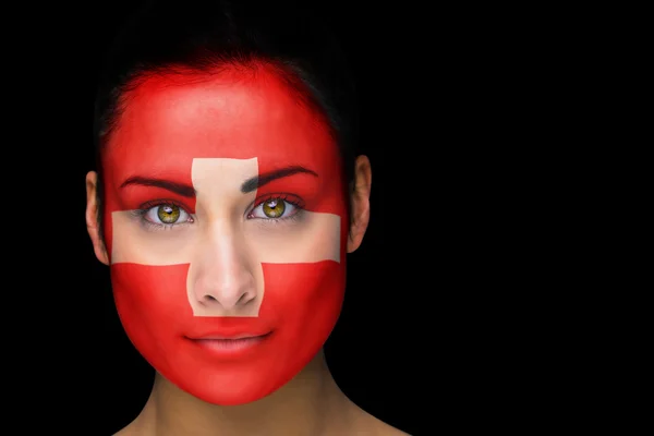 瑞士球迷脸上涂满颜料的复合图像 — 图库照片