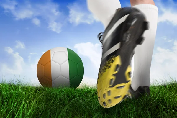 Football boot kicking ivory coast ball — Stock Photo, Image