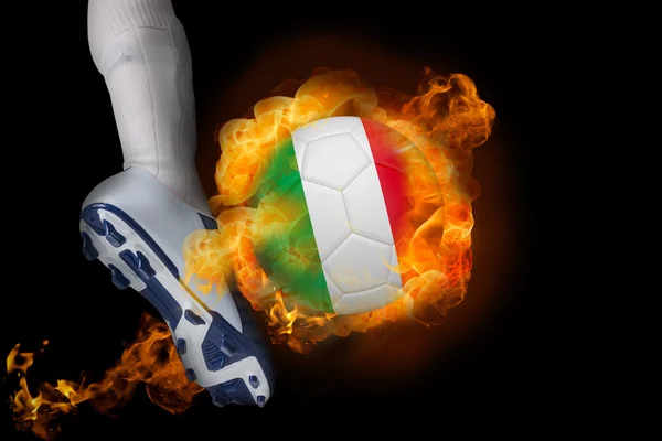 Football player kicking flaming italy ball — Stock Photo, Image