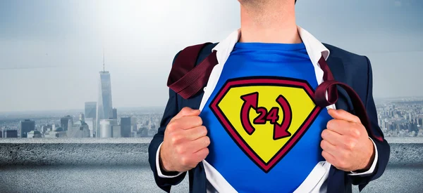 Businessman opening shirt in superhero style — Stock Photo, Image
