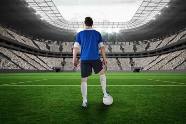 Handsome football player in blue jersey — Stock Photo, Image