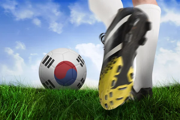 Bota de futebol chutando bola da república da Coréia — Fotografia de Stock