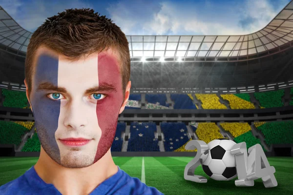 Young france fan with face paint — Stock Photo, Image