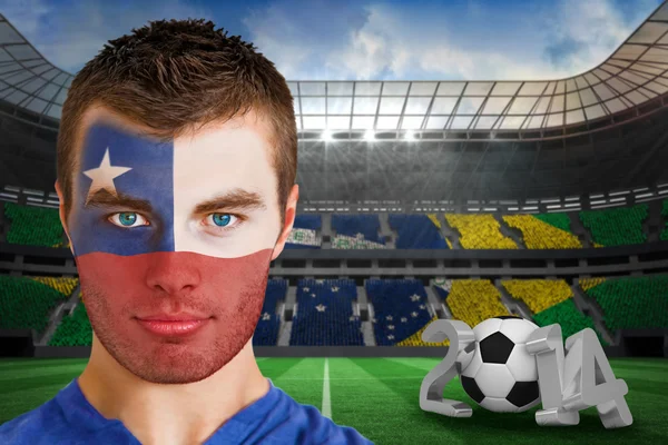 Composite image of serious young chile fan with face paint — Stock Photo, Image