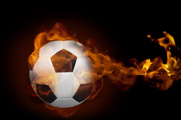 Imagen compuesta de fuego que rodea al fútbol —  Fotos de Stock