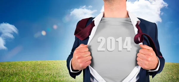 Businessman opening shirt in superhero style — Stock Photo, Image