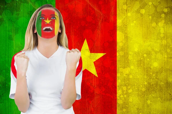 Excited cameroon fan in face paint — Stock Photo, Image