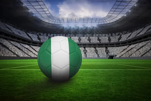 Imagem composta de futebol em cores nigerianas — Fotografia de Stock