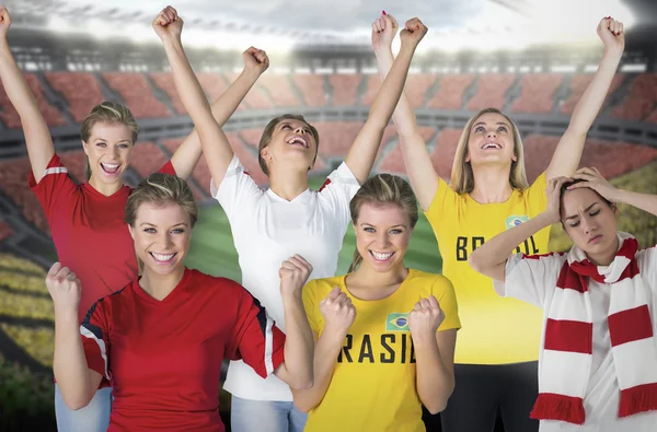 Composite image of various football fans — Stock Photo, Image