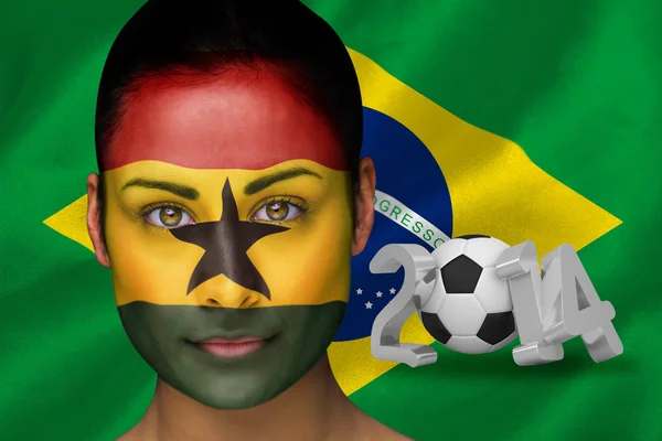 Imagem composta de fã de futebol ghana em pintura facial — Fotografia de Stock