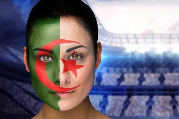 Composite image of beautiful iran fan in face paint — Stock Photo, Image