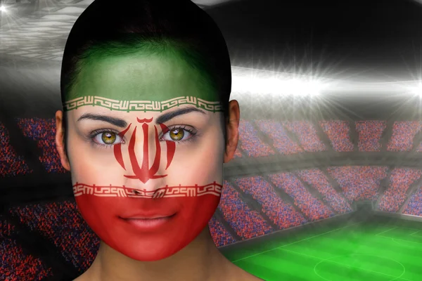 美丽的伊朗球迷脸上涂满颜料的复合图像 — 图库照片