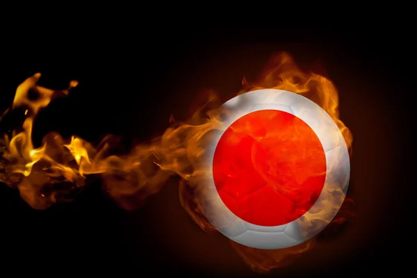 Sammensatt bilde av ild rundt japansk ball – stockfoto