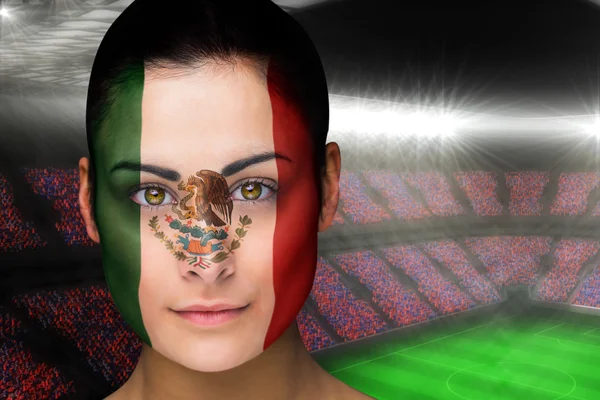 Composite image of beautiful mexico fan in face paint — Stock Photo, Image