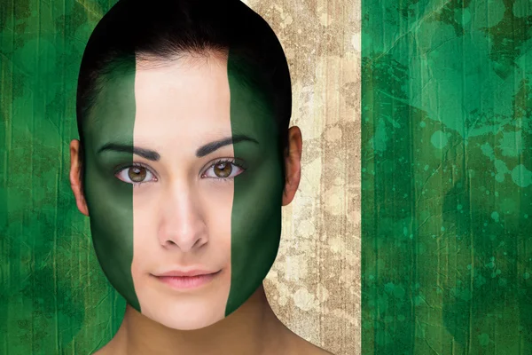 Beautiful football fan in face paint — Stock Photo, Image