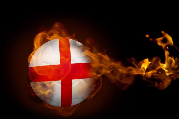 Композитне зображення вогню, що оточує англіканський м'яч — стокове фото