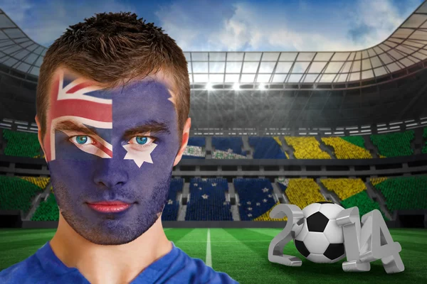 Composite image of serious young australia fan with face paint — Stock Photo, Image