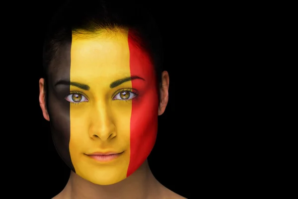 Composite image of belgian football fan in face paint — Stock Photo, Image