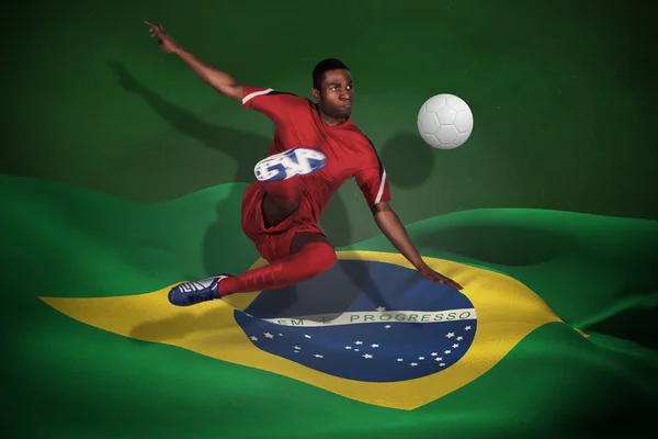 Σύνθετη εικόνα ποδοσφαιριστή σε κόκκινο κλοτσιές — Φωτογραφία Αρχείου