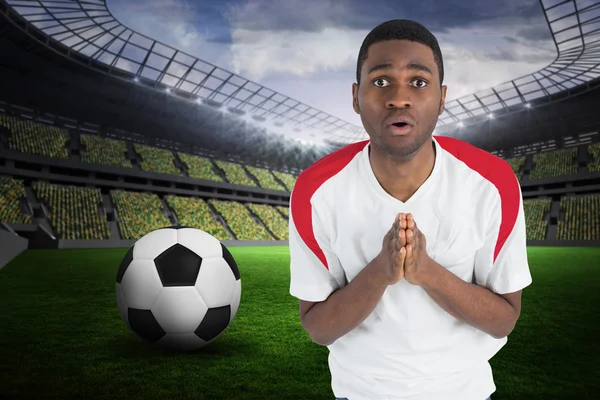 Nervous football fan in white looking ahead — Stock Photo, Image