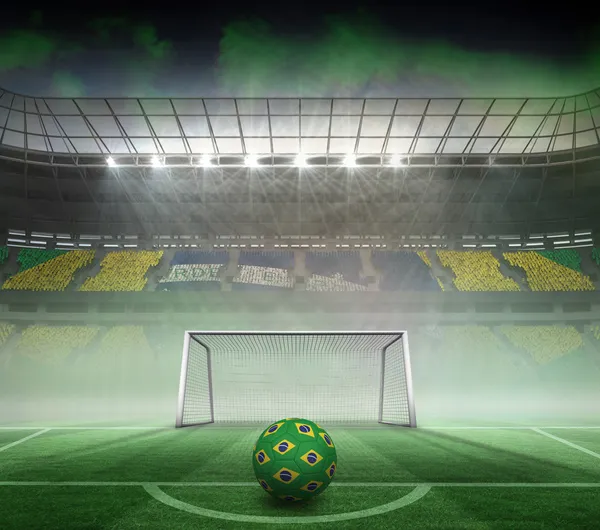 Sammansatt bild av fotboll i brasilianska färger — Stockfoto