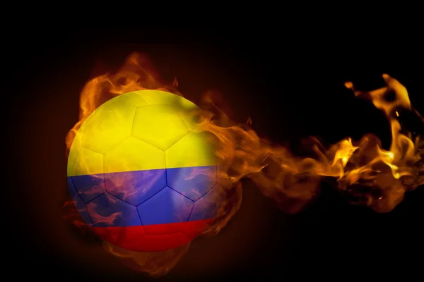 Composite image of fire surrounding colombia ball — Stock Photo, Image