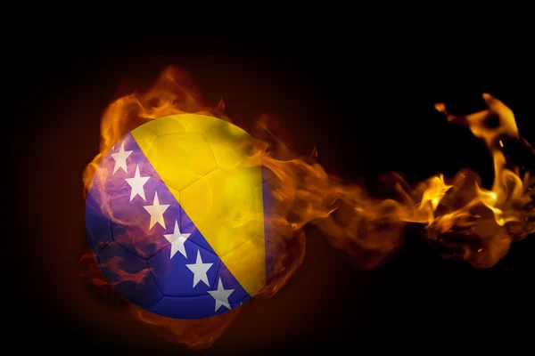 Composite image of fire surrounding bosnia ball — Stock Photo, Image