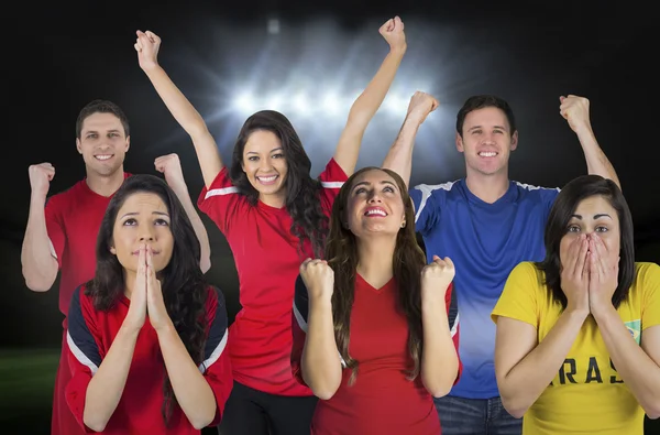 Composite image of various football fans — Stock Photo, Image