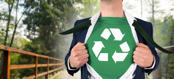 Businessman opening shirt in superhero style — Stock Photo, Image