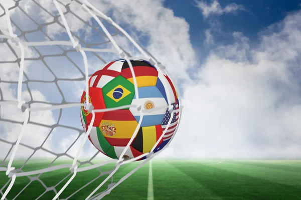 Zusammengesetztes Bild des Fußballs in den multinationalen Farben — Stockfoto