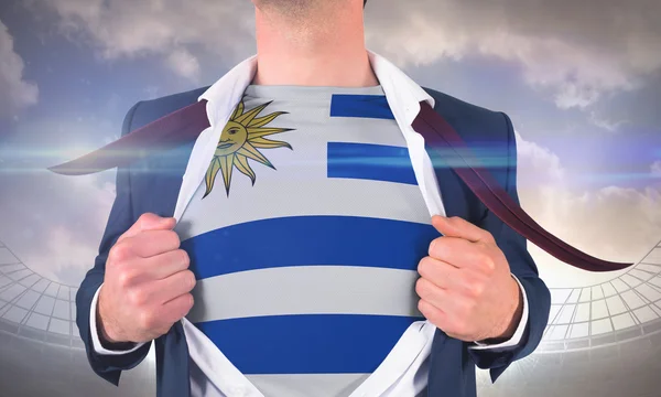 Zakenman opening shirt te onthullen uruguay vlag — Stockfoto