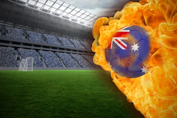 Imagen compuesta de fuego que rodea australia bandera de fútbol —  Fotos de Stock