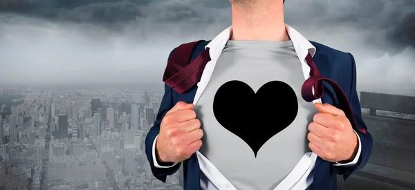 Businessman opening shirt in superhero style — Stock Photo, Image