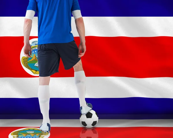 Guapo jugador de fútbol en jersey azul —  Fotos de Stock