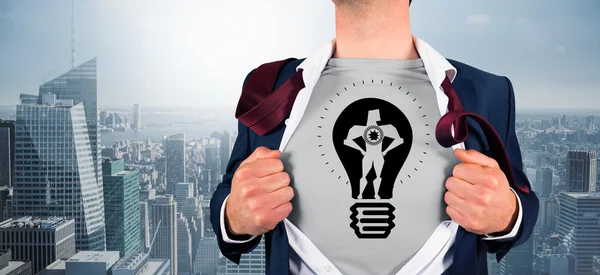Imagem composta de homem de negócios camisa de abertura em estilo de super-herói — Fotografia de Stock