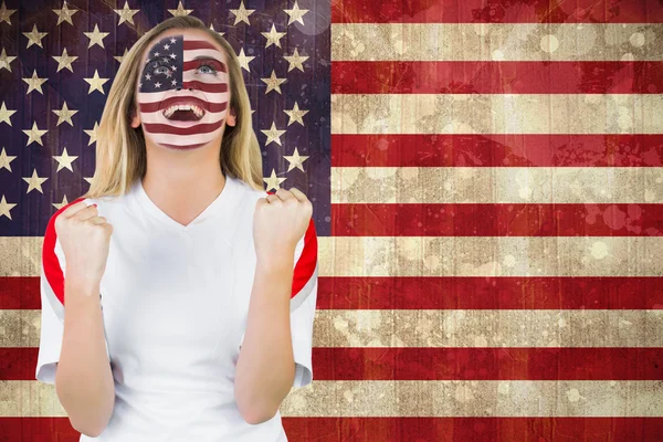Excited fan in usa face paint Stock Picture