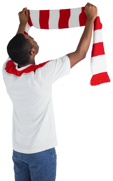 Happy football fan waving scarf — Stock Photo, Image