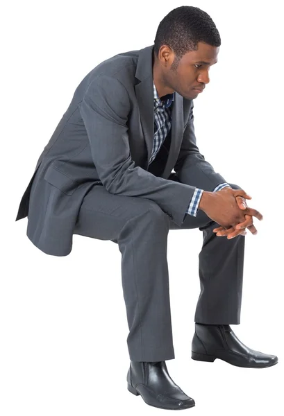 Thinking businessman sitting — Stock Photo, Image