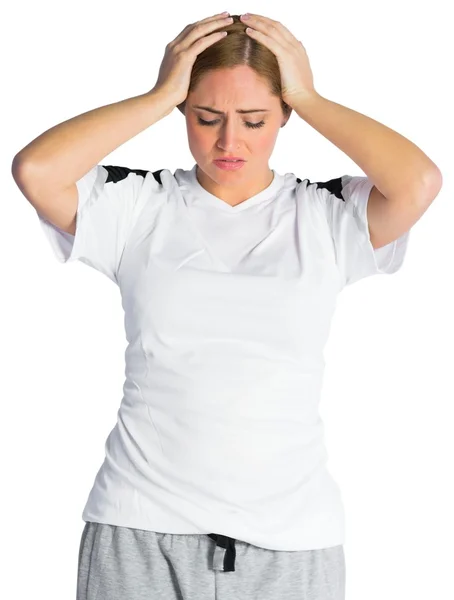 Disappointed football fan looking down — Stock Photo, Image