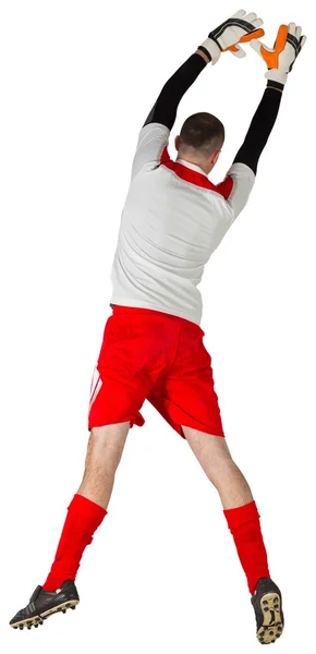 Fit goal keeper jumping up — Stock Photo, Image