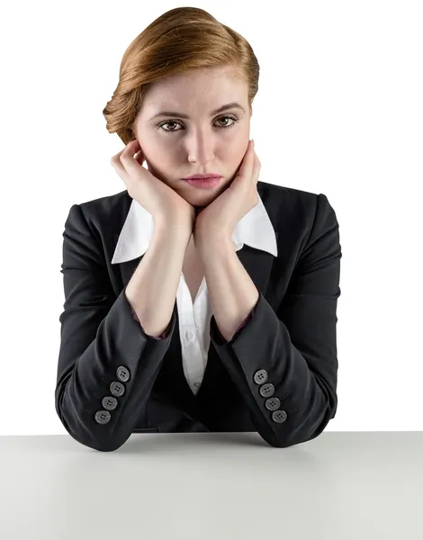 Pelirroja mujer de negocios buscando infeliz — Foto de Stock