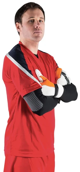 Goalkeeper in red looking at camera — Stock Photo, Image