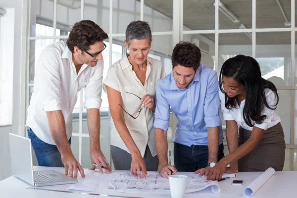 Business people working hard on plans — Stock Photo, Image