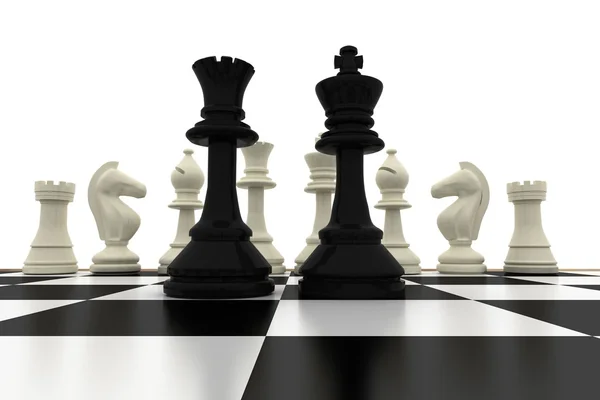 Black king and queen standing in front of white pieces — Stock Photo, Image