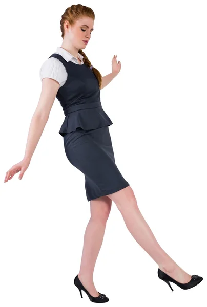 Businesswoman doing a balancing act — Stock Photo, Image