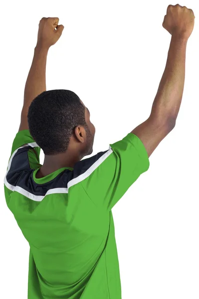 Fußballfan im grünen Trikot — Stockfoto