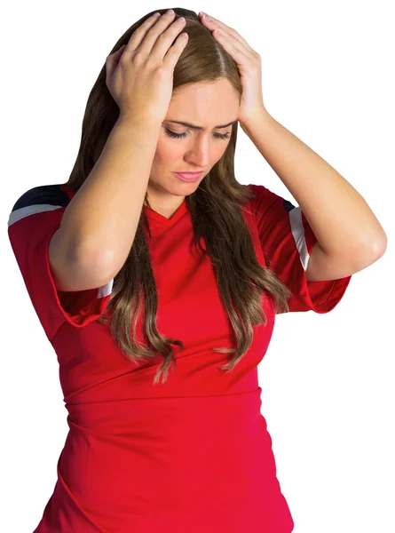 Disappointed football fan looking down — Stock Photo, Image