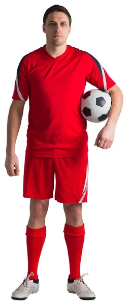 Handsome football player looking at camera — Stock Photo, Image