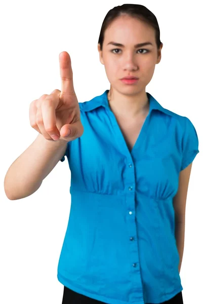 Serious businesswoman pointing — Stock Photo, Image