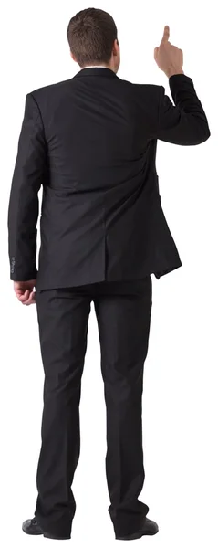 Uomo d'affari in giacca e cravatta che punta dito — Foto Stock
